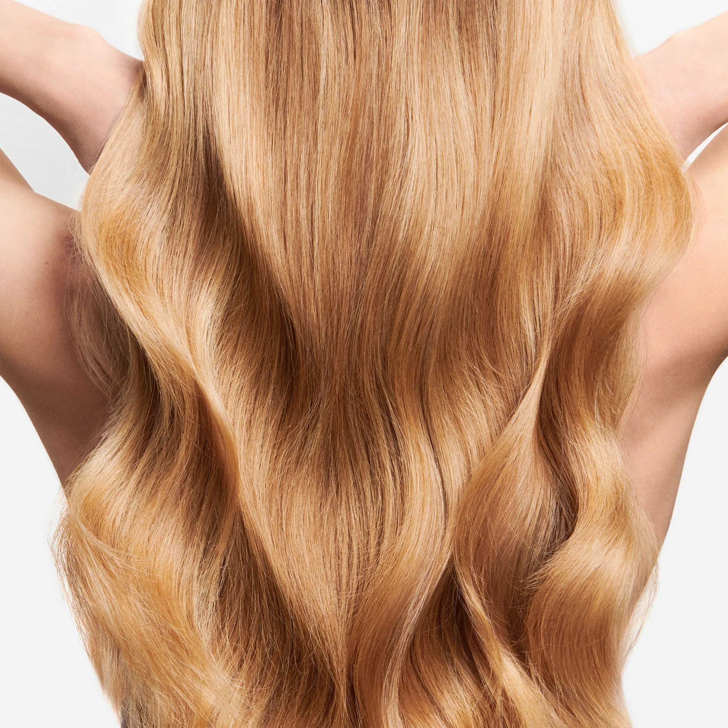 Model with shiny blonde long hair