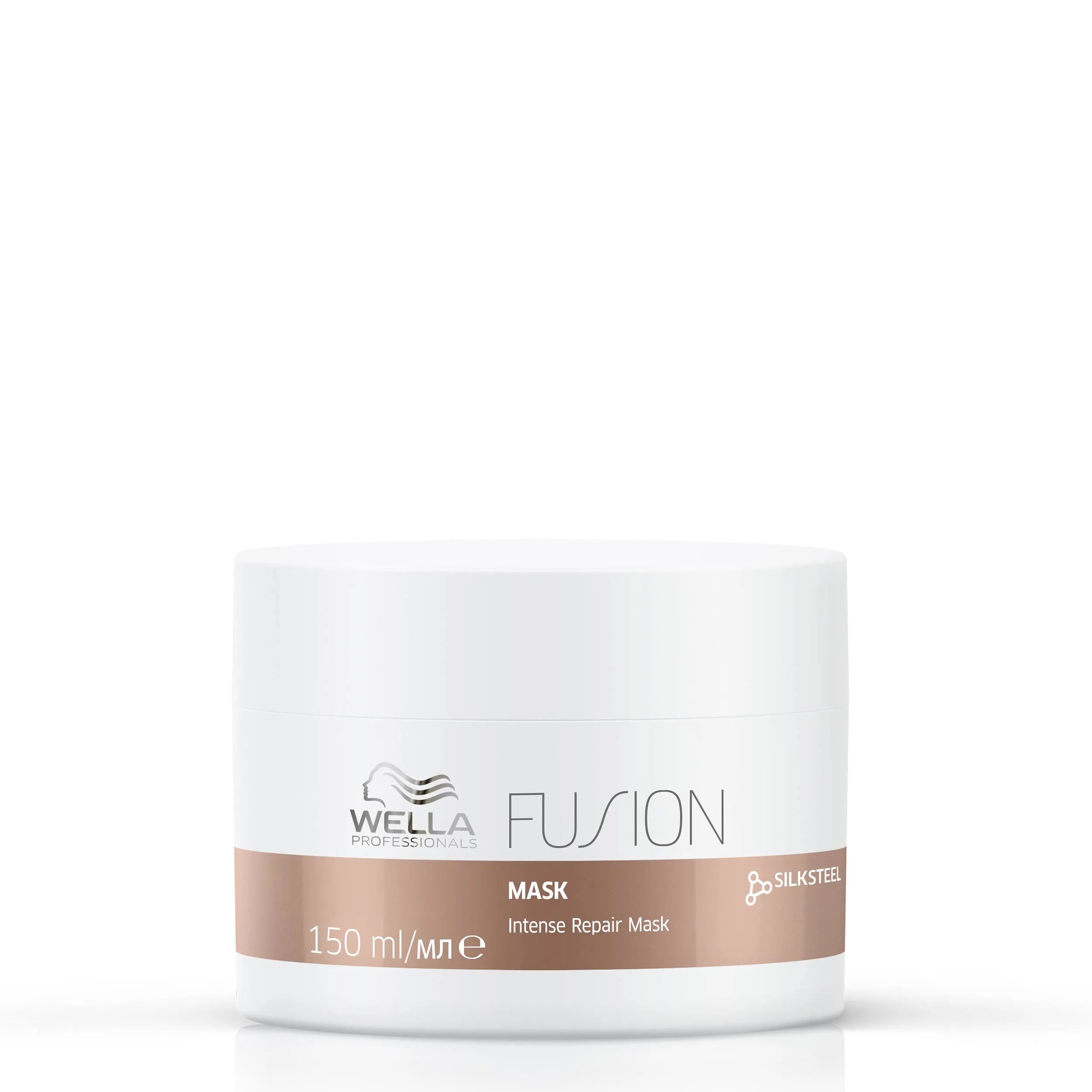 Woman holds up the Wella Fusion Intense Repair Mask.