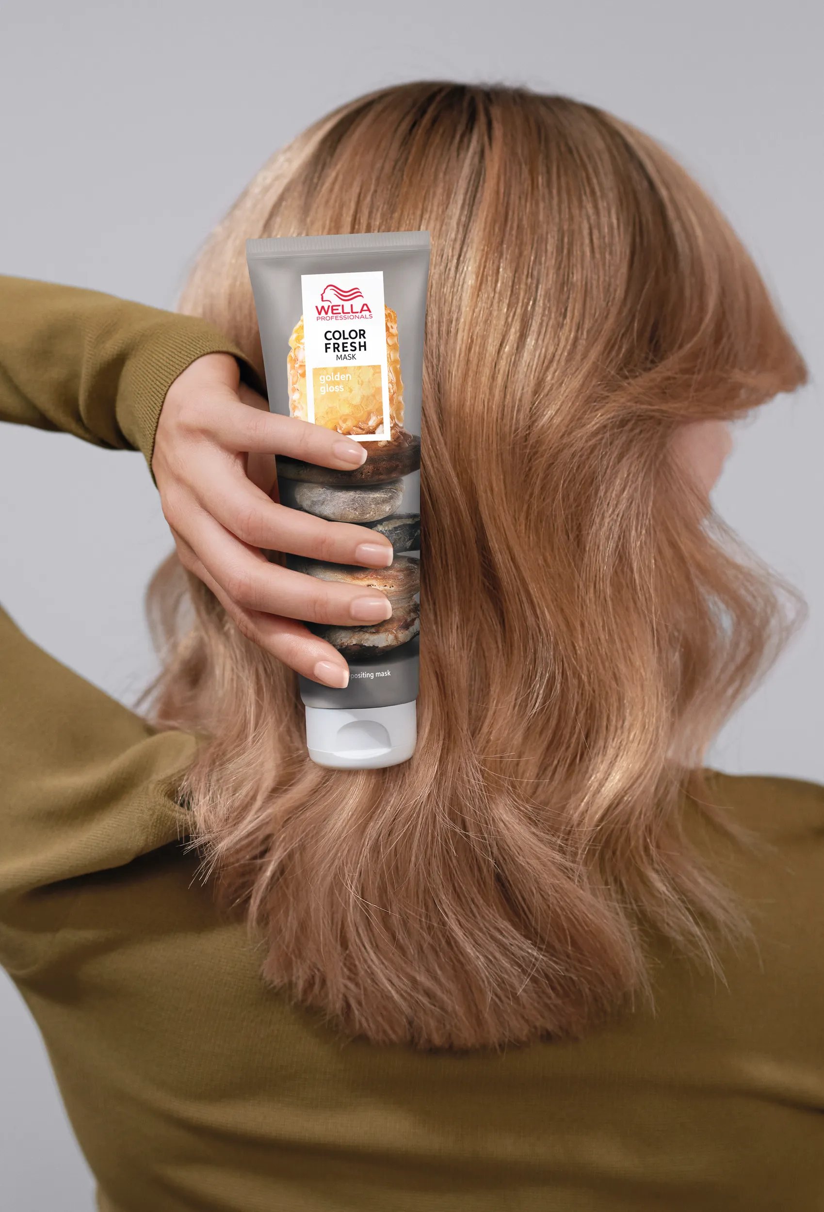 Back of woman’s head with bronde hair and Color Fresh Mask 