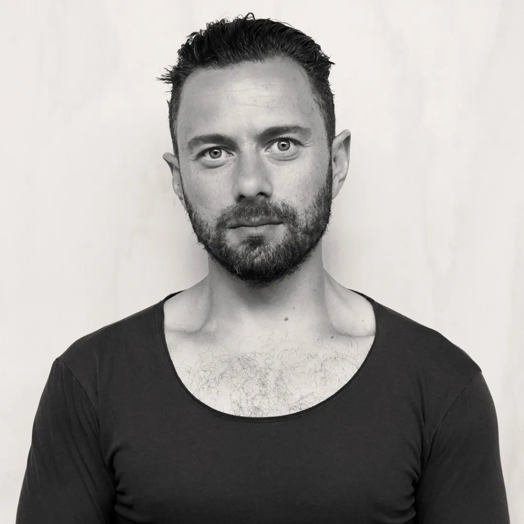 Black and white photo of Frank Apostolopoulos
