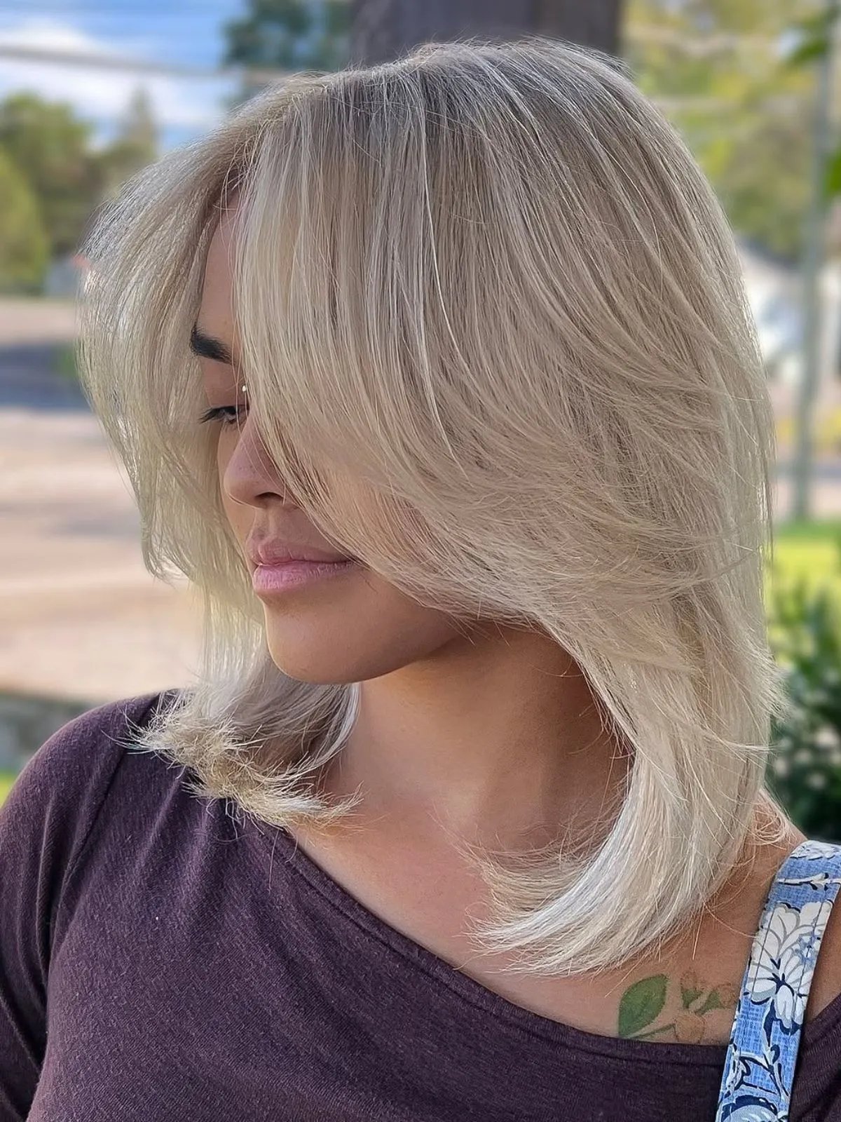Model with platinum pearl blonde hair.