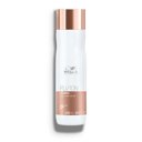 Packshot of Wella Professionals Fusion Intense Repair Shampoo - a white bottle with a bronze banner, bronze lid and silver Wella logo.