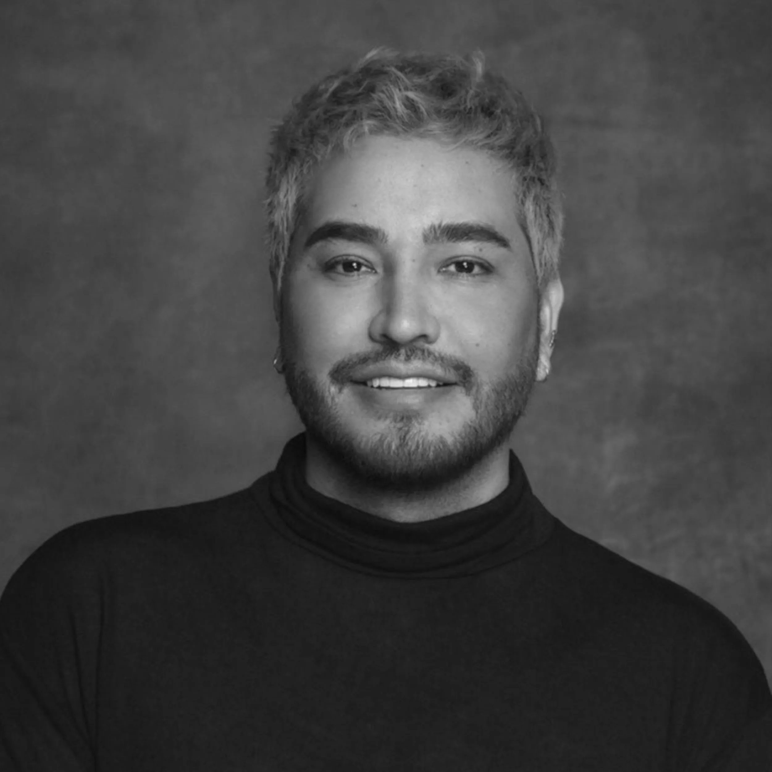 Black and white portrait of Daniel Mora