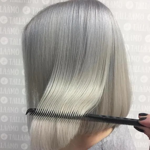 Woman with classic, blonde bob, created using Wella Professionals