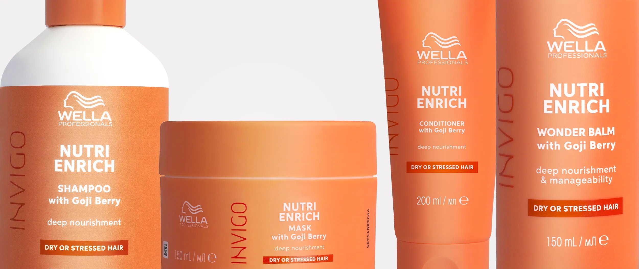 Wella Invigo Nutri-Enrich shampoo, conditioner, mask, and balm product shot.