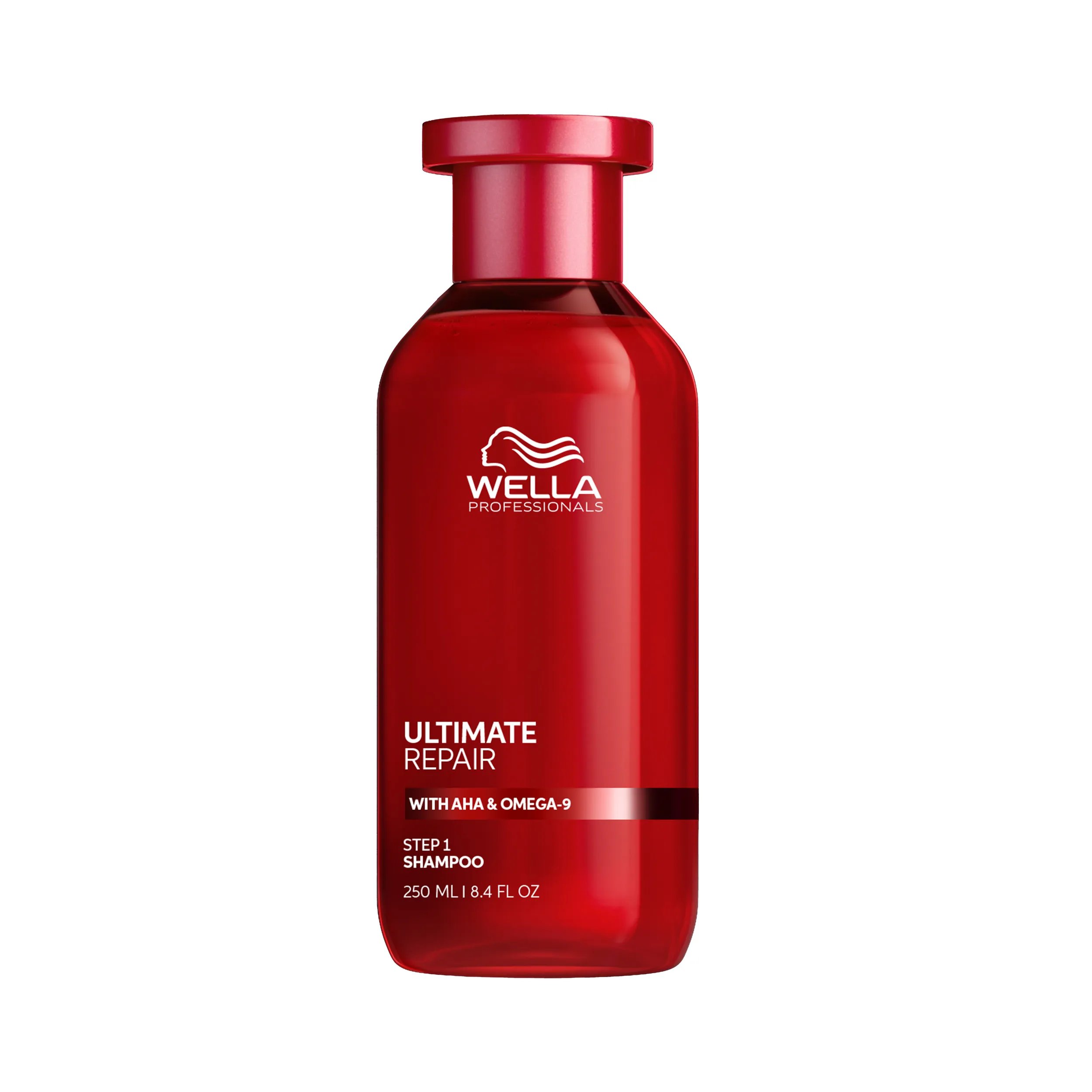 Eine rote Flasche Ultimate Repair Shampoo bei geschädigtem Haar von Wella Professionals