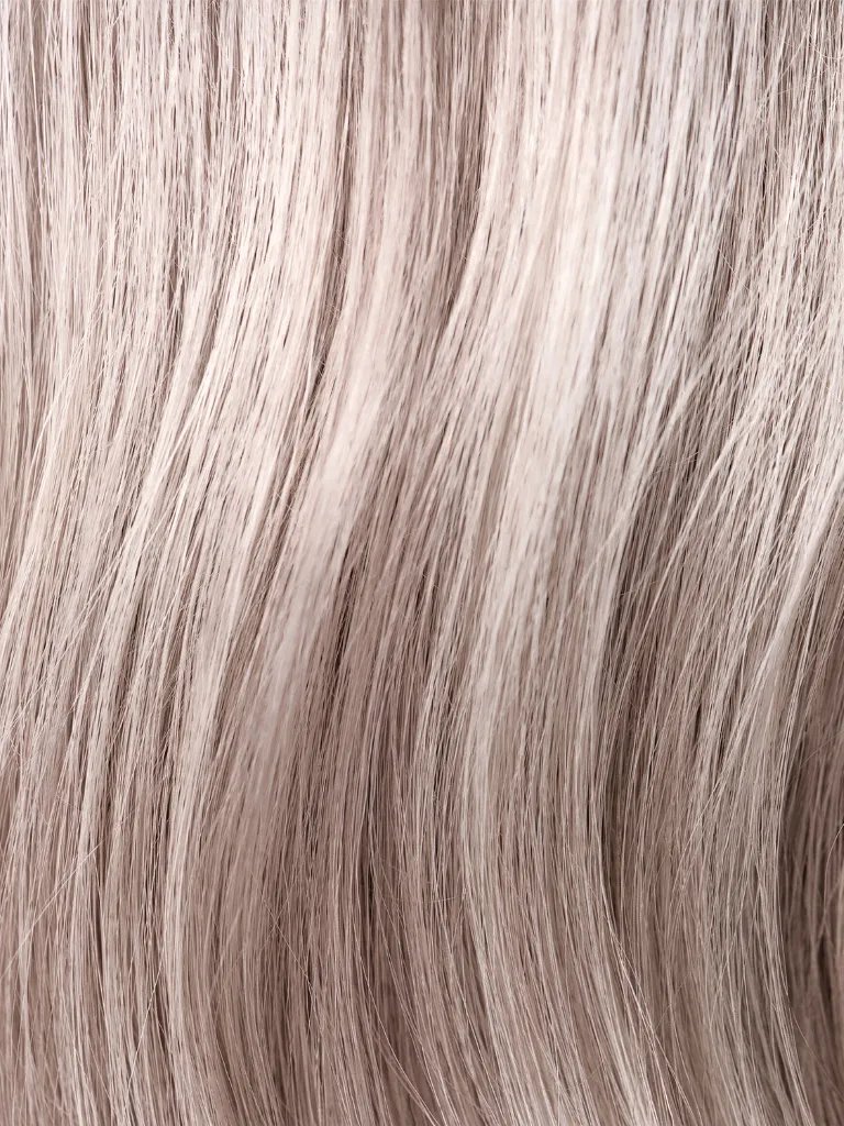 Close-up of model’s cool blonde hair.