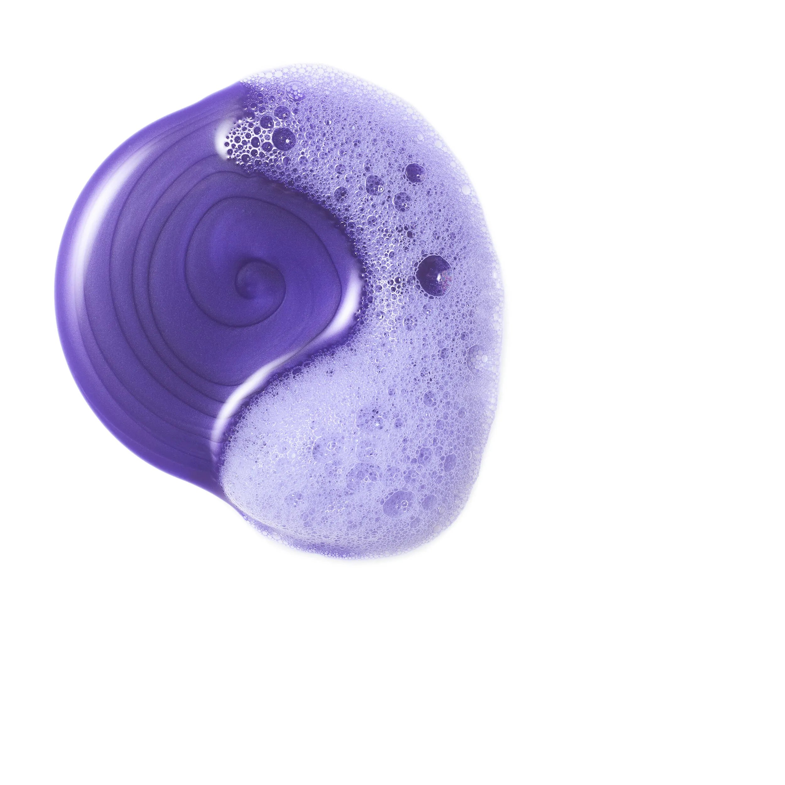 Close-up photograph of a purple circular blob of Invigo blonde recharge conditioner on a white bakground.