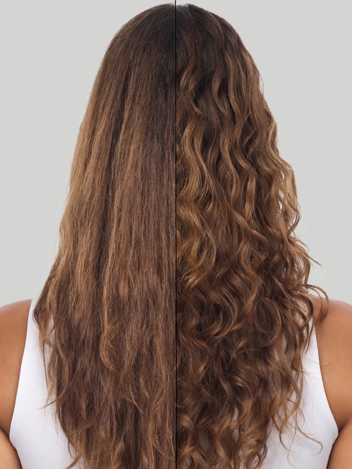 Before and after showing model’s light brown, wavy hair appearing healthier after using ULTIMATE REPAIR. 