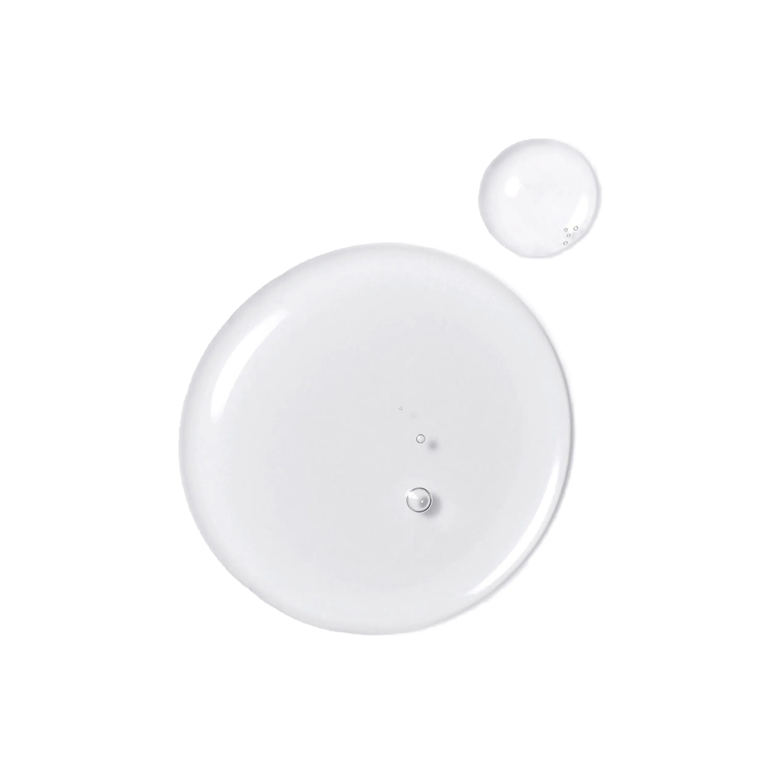 Una goccia di Wella Professionals Oil Reflections Luminos Reveal Shampoo a dimostrazione della texture.