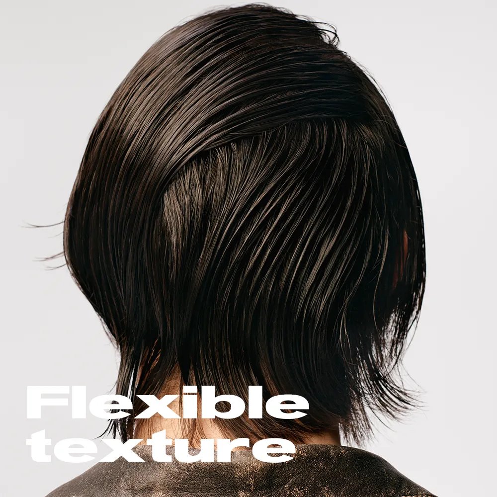 Image of a the back of a model's head on a white background. Model has short brunette hair in a wet-look style. Text overlay states "Flexible Texture"