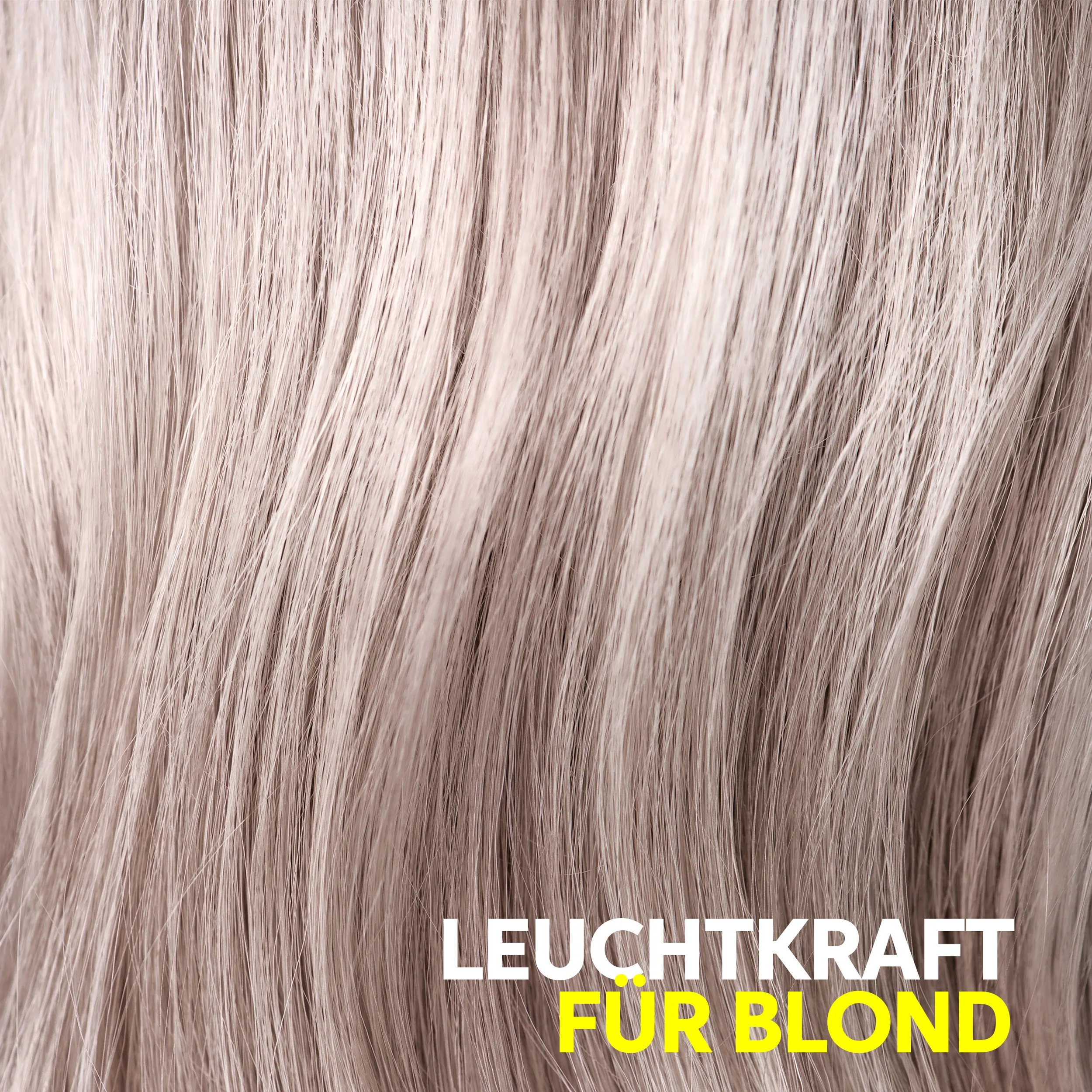 Close-up photograph of strand of hair with text "Leuchtkraft fûr blond".