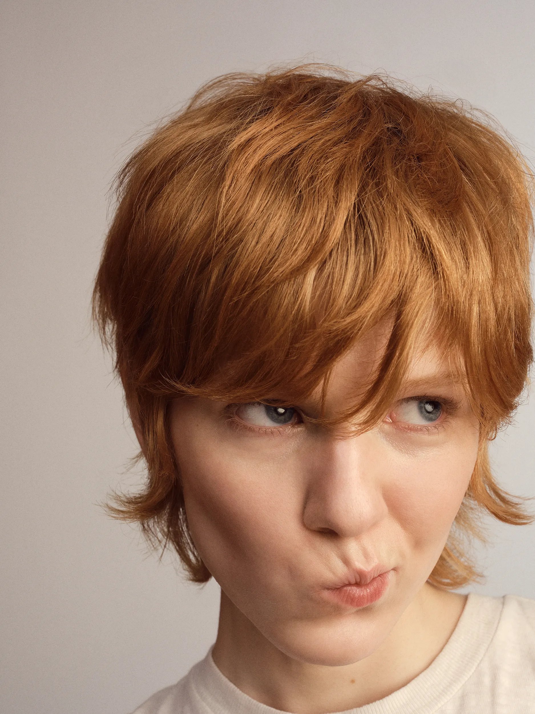 Model with short red hair