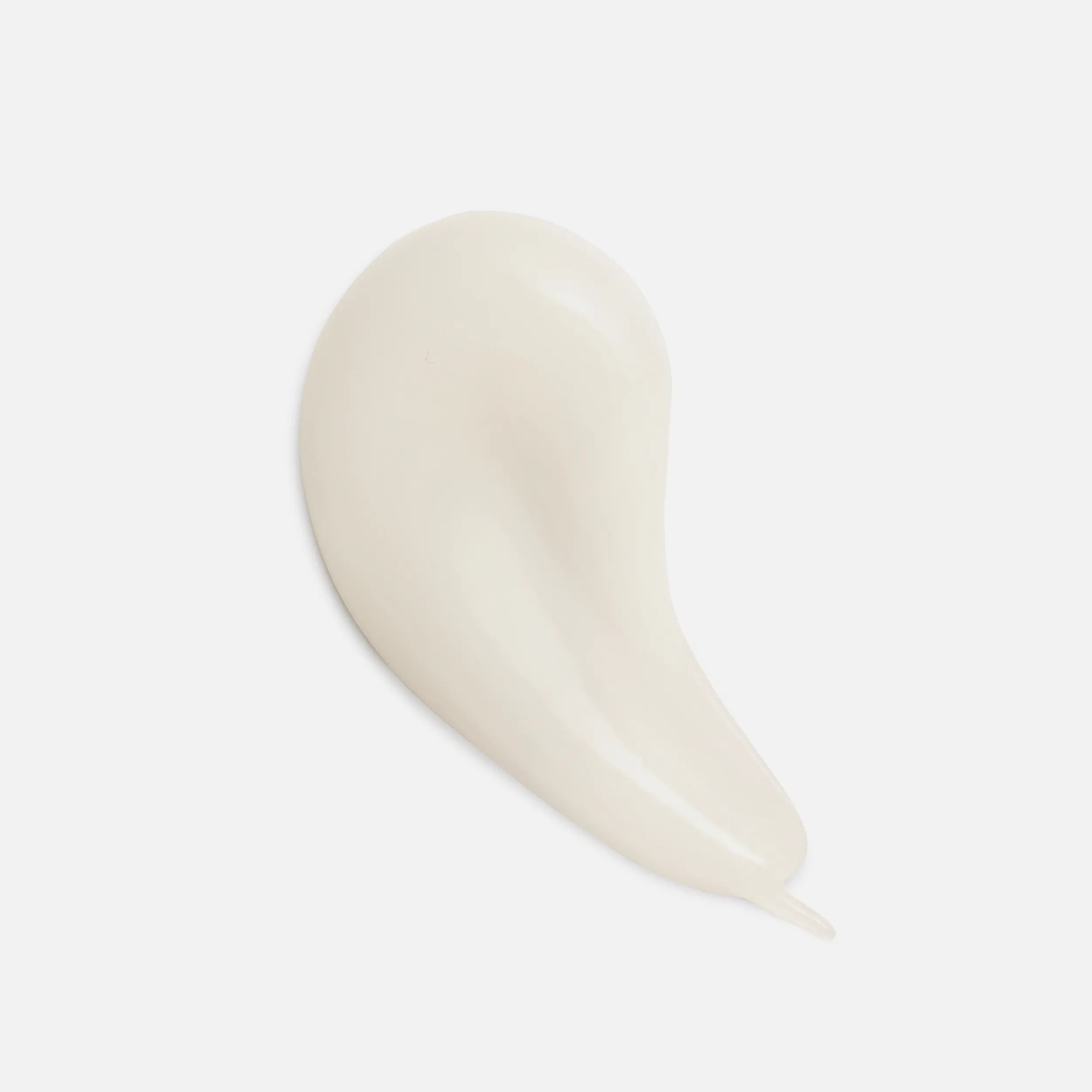 Swirl of cream on a white background.