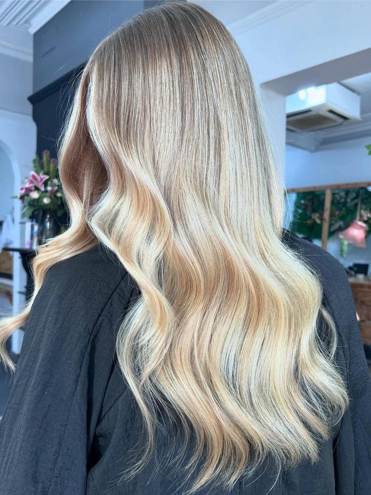 Model with long, loosely tousled, butter blonde hair.