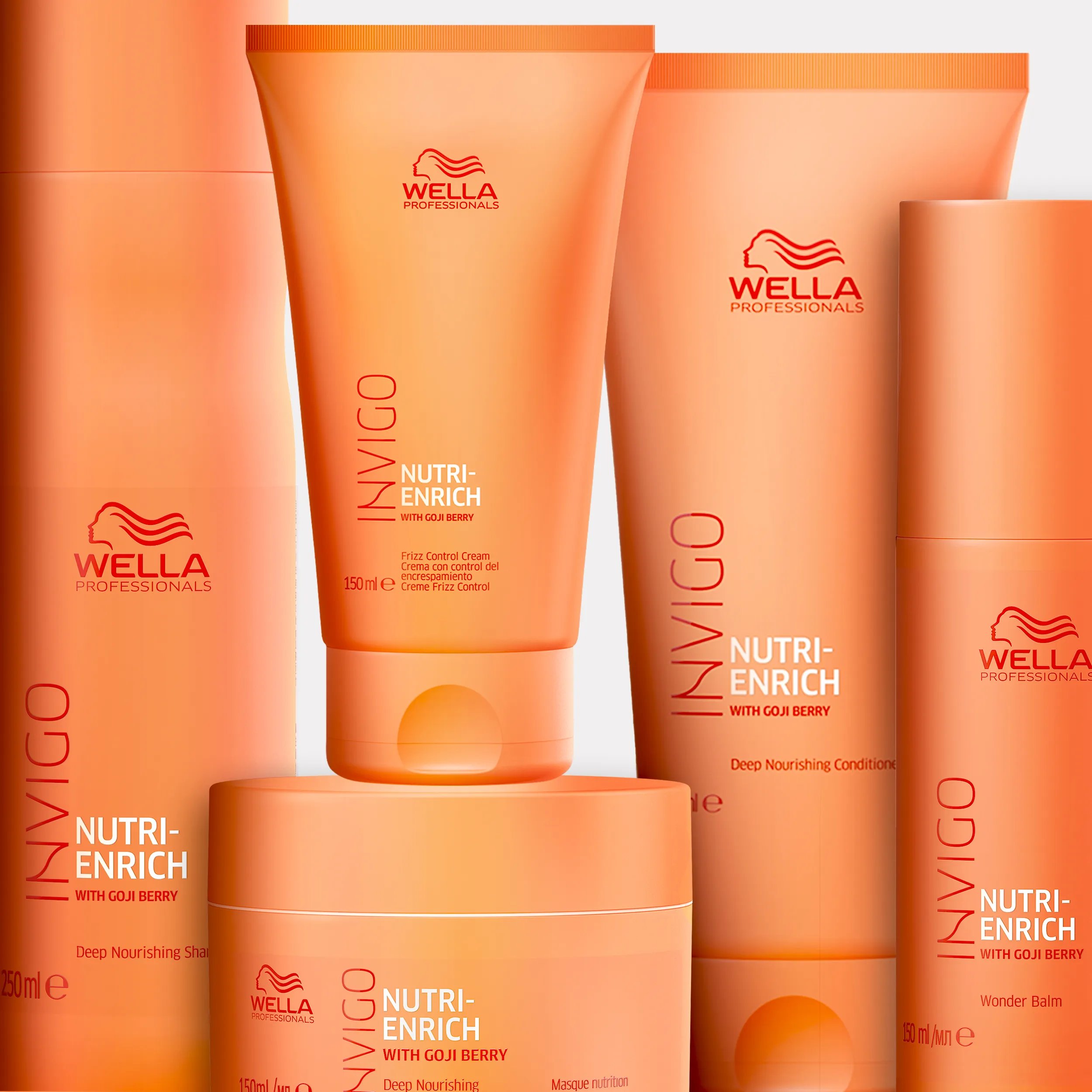 Wella Invigo Nutri-Enrich shampoo, conditioner, mask, and balm product shot.