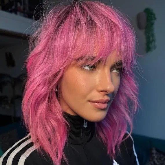 Model with pink wavy hair