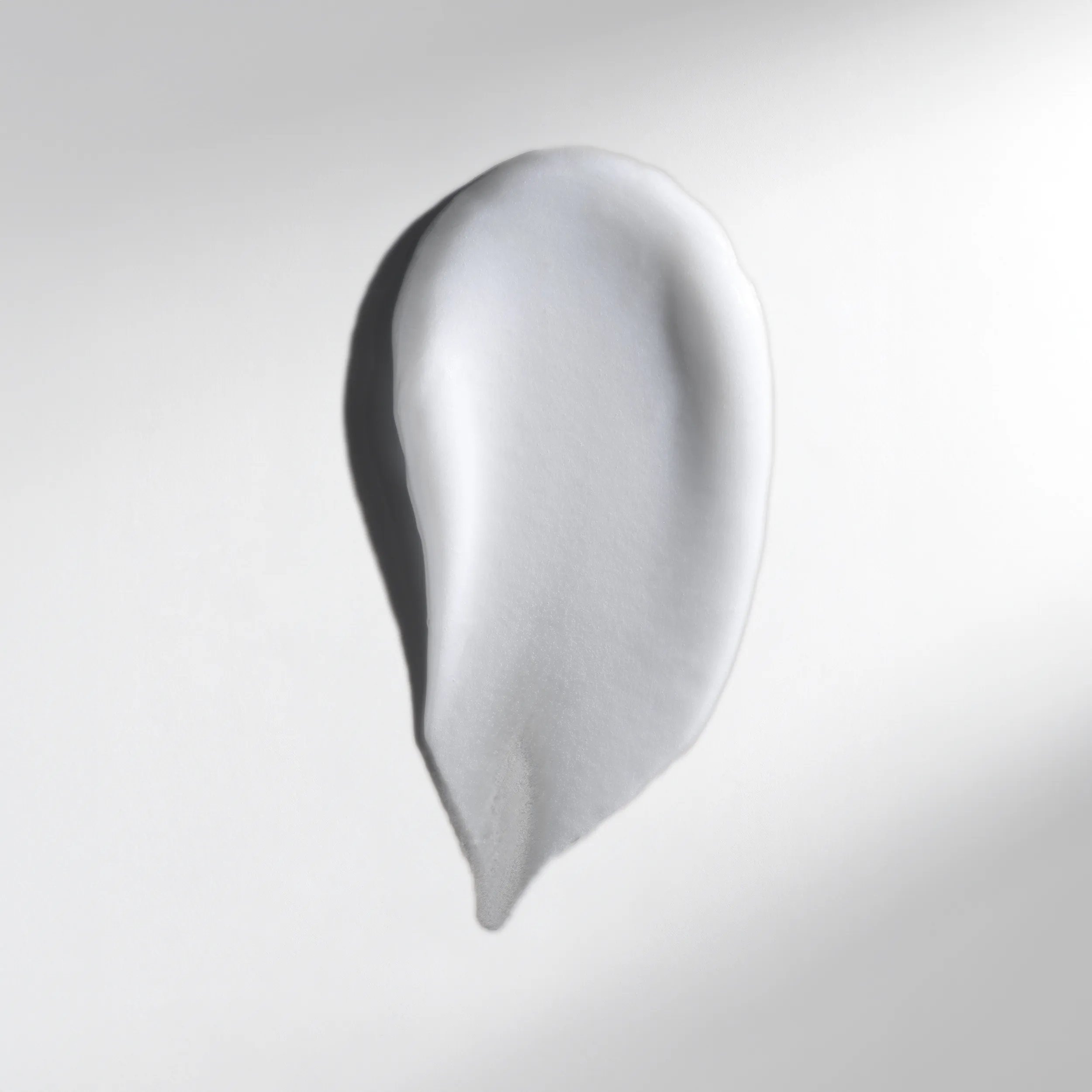 Drop of Wella Professionals Ultimate Smooth Mask to demonstrate texture.