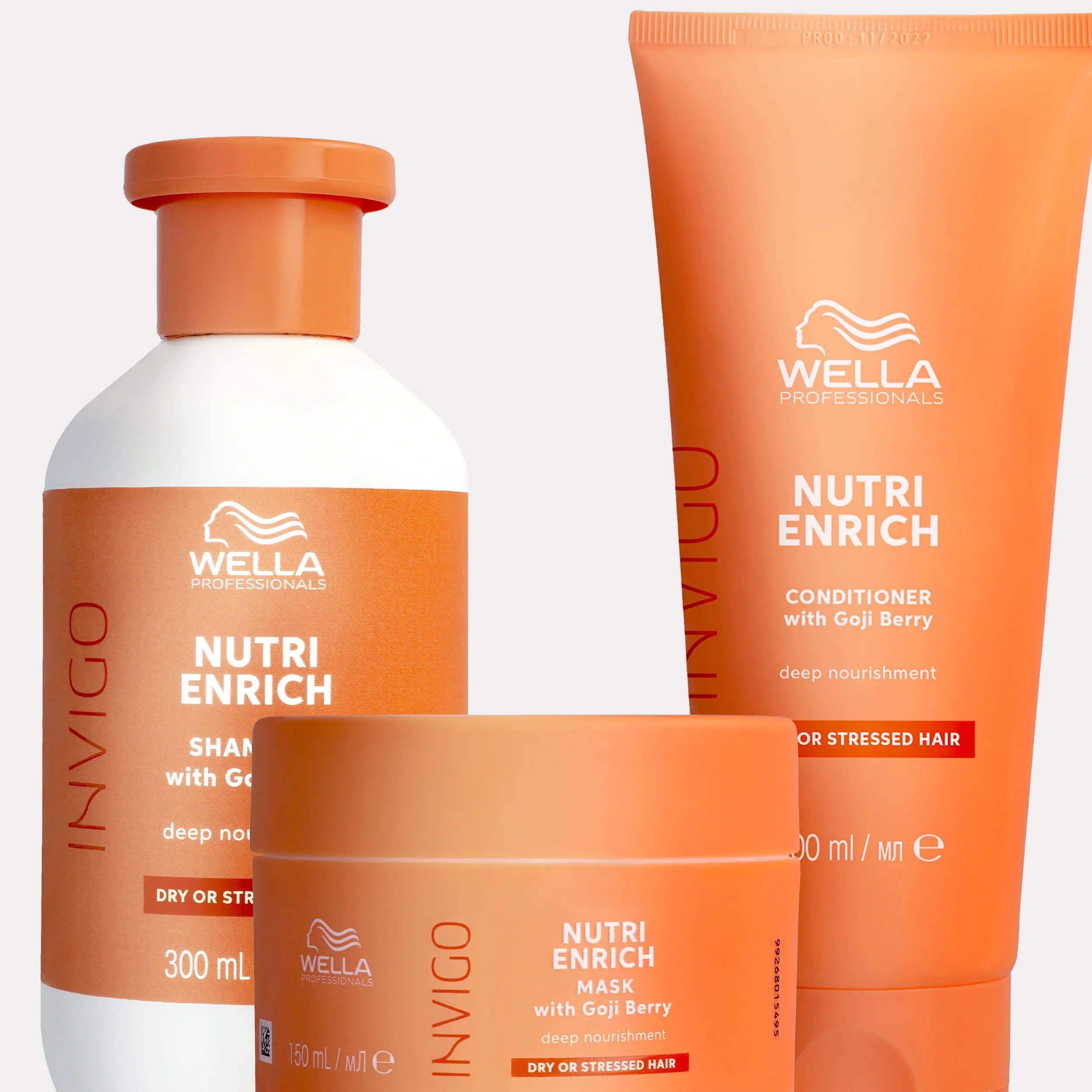 Wella Invigo Nutri-Enrich shampoo, conditioner, mask, and balm product shot.