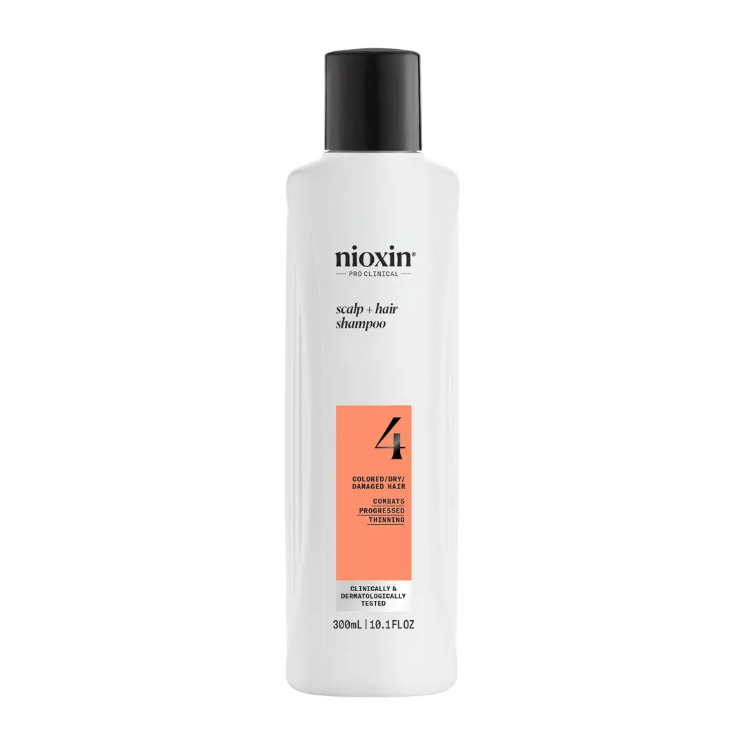 Nioxin System 4 shampoo bottle against white background