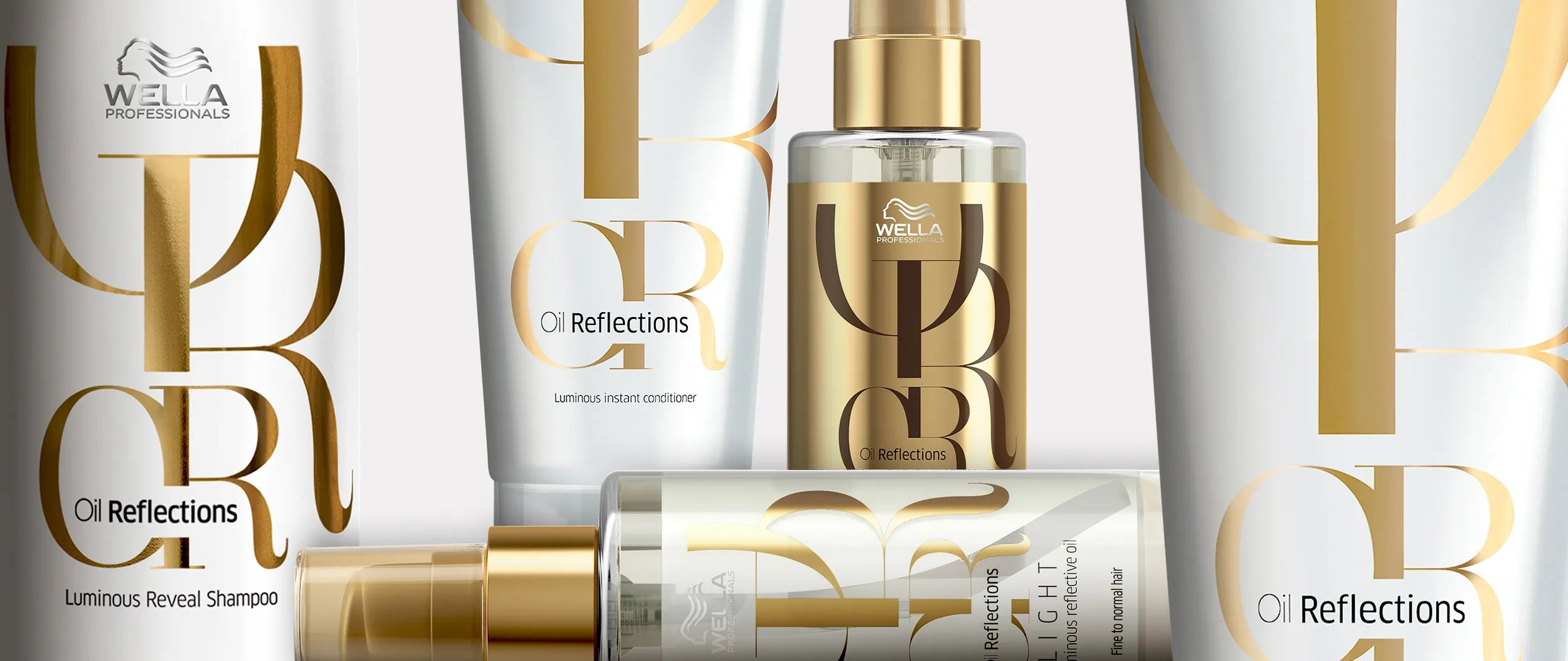 Wella Oil Reflections shampoo, conditioner, hair oil, and smoothing oil product shot.
