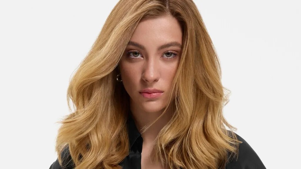 Model with long, smooth, blonde hair.