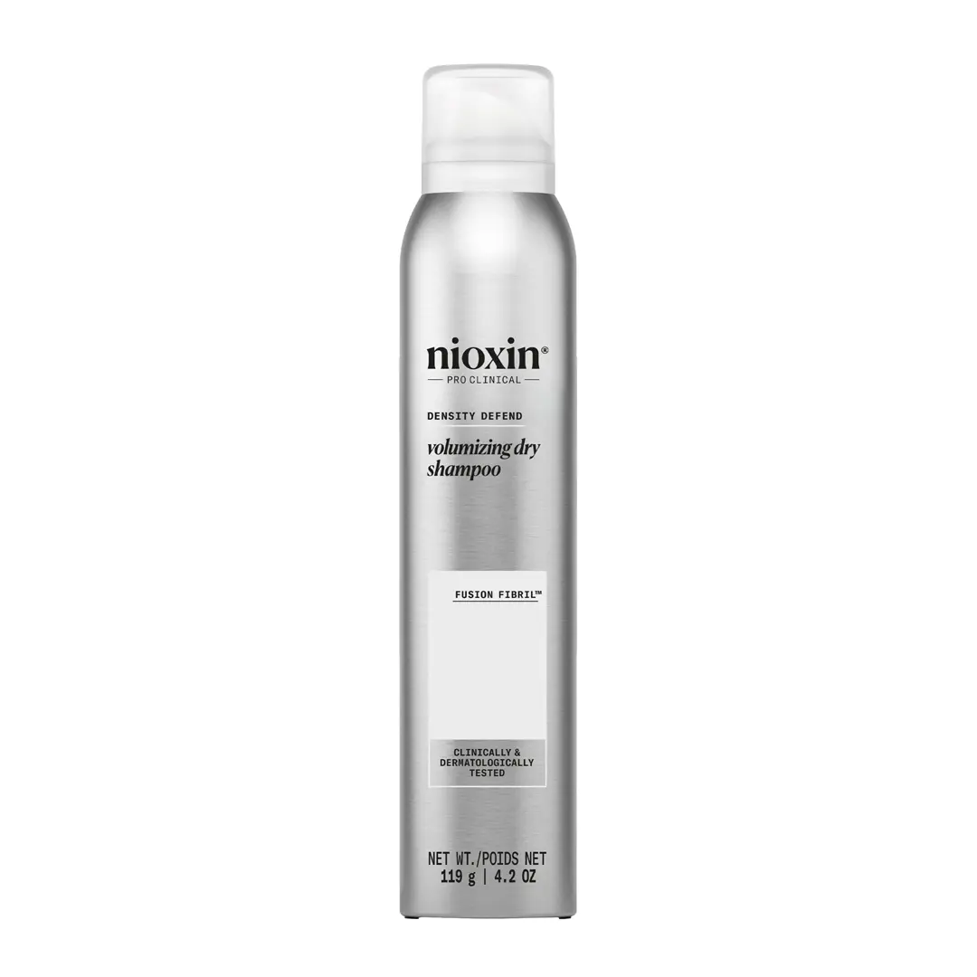 Nioxin Volumizing Dry Shampoo bottle against white background