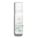 A white bottle of Wella Professionals NutriCurls shampoo.