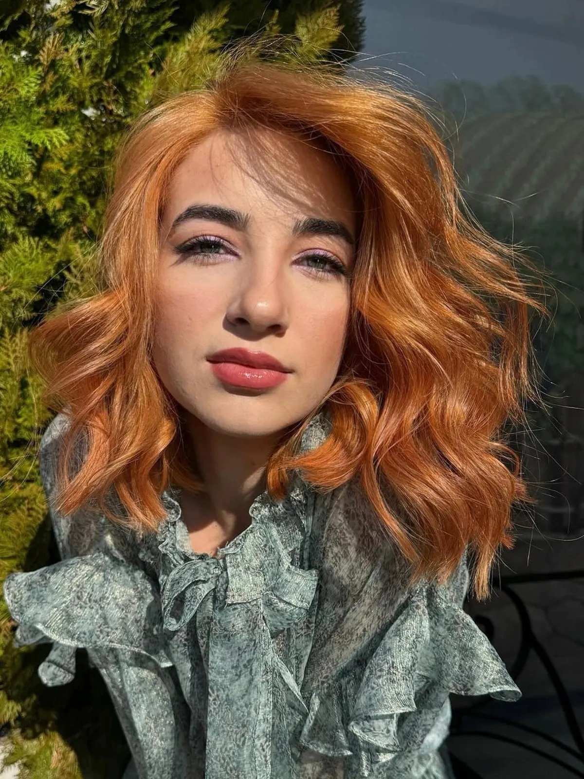 Golden copper blonde hair with a radiant, sunlit finish.