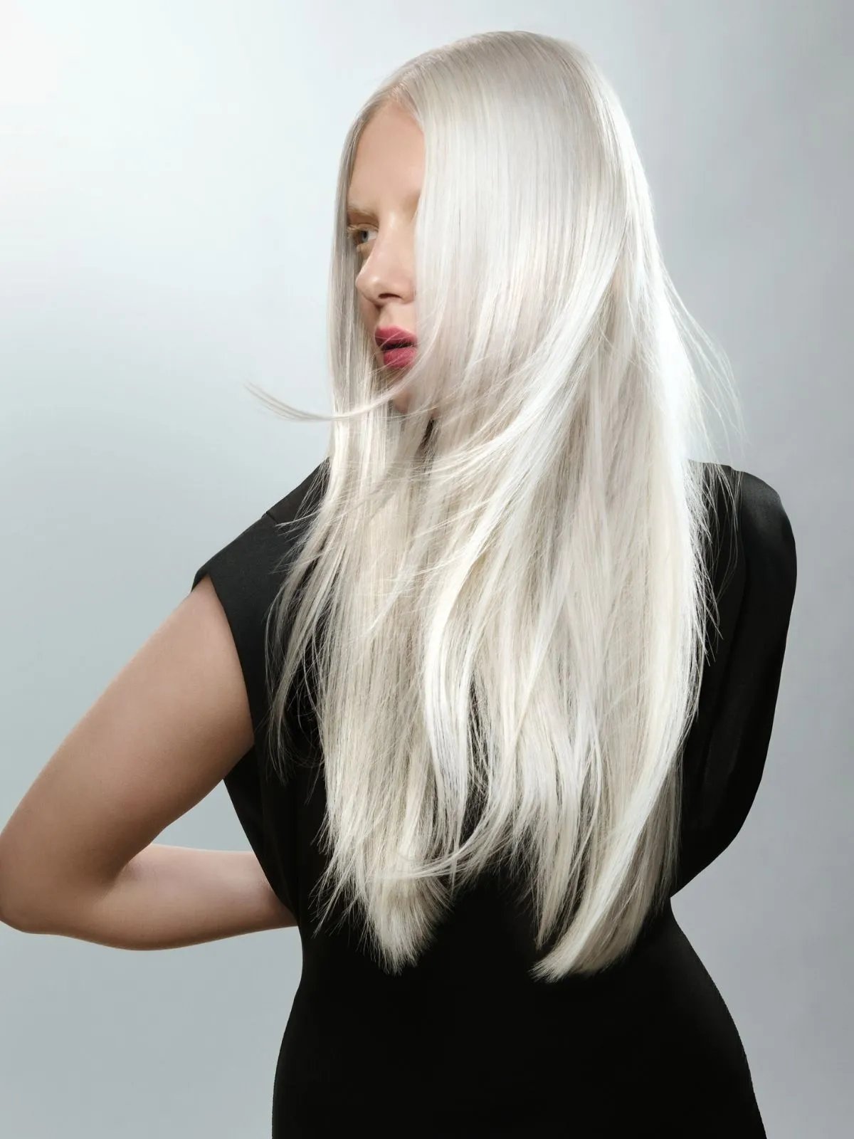 Model with long, sleek, icy platinum hair.