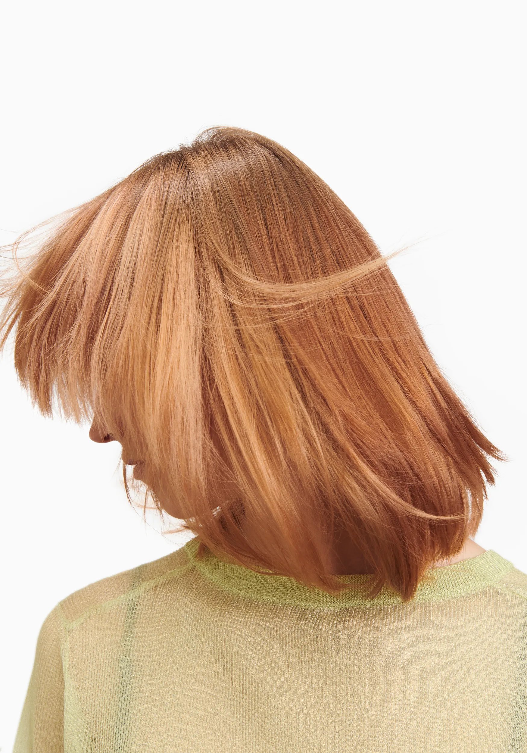 Model with short, red hair