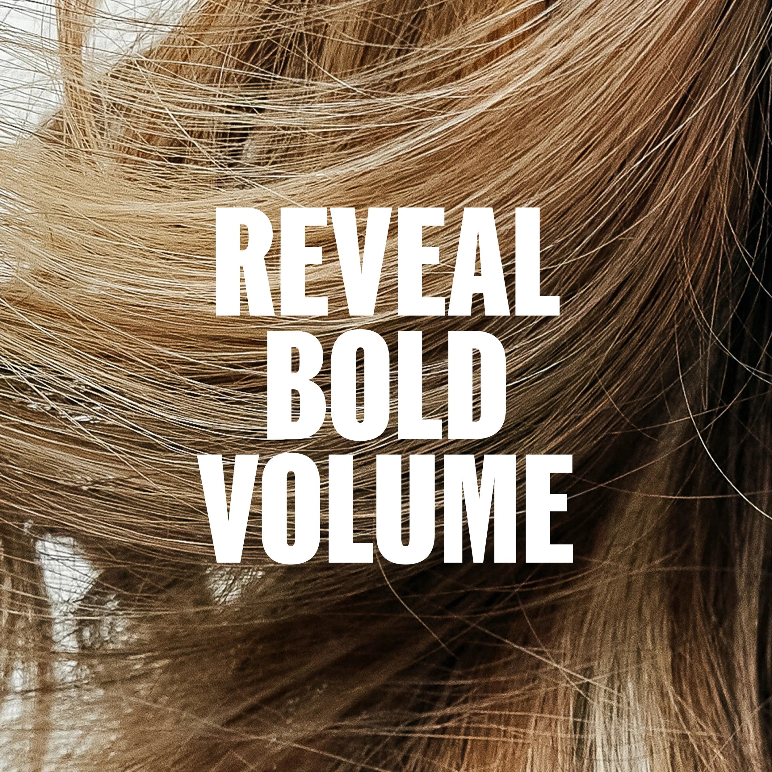 Close-up of blonde, wavy hair with the text "REVEAL BOLD VOLUME" overlaid in white.