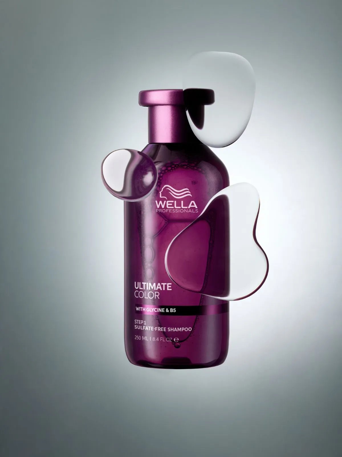 ULTIMATE COLOR Shampoo on a grey background.