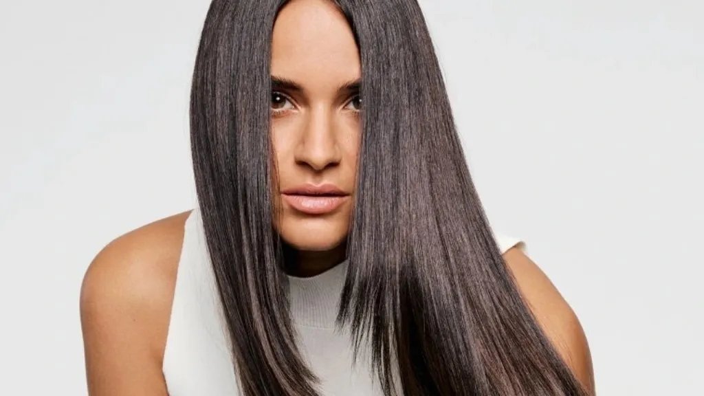 Model with long, dark brown, silky hair.