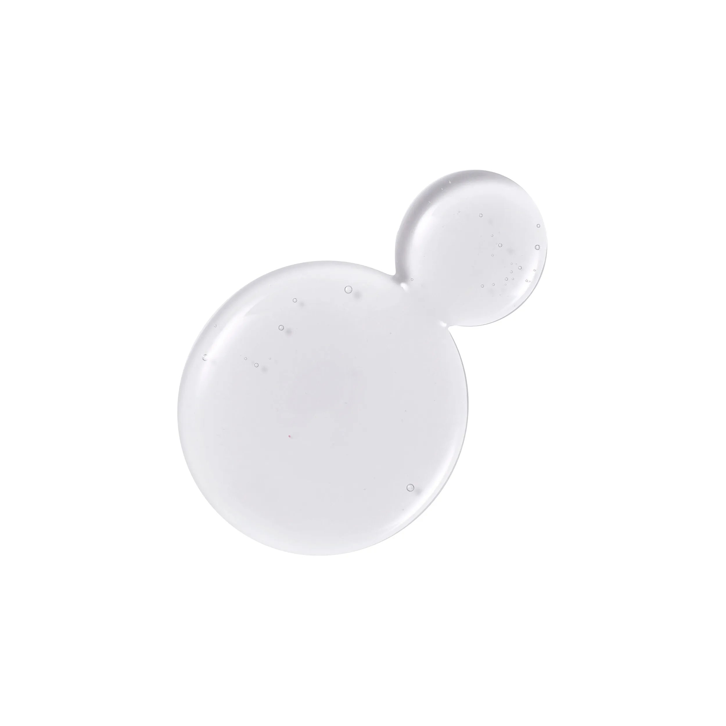 Close-up photograph of a circular blob of Invigo scalp balance sensitive shampoo on a white background. 