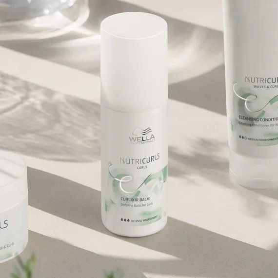 NutriCurls Curlixir Balm on white background.