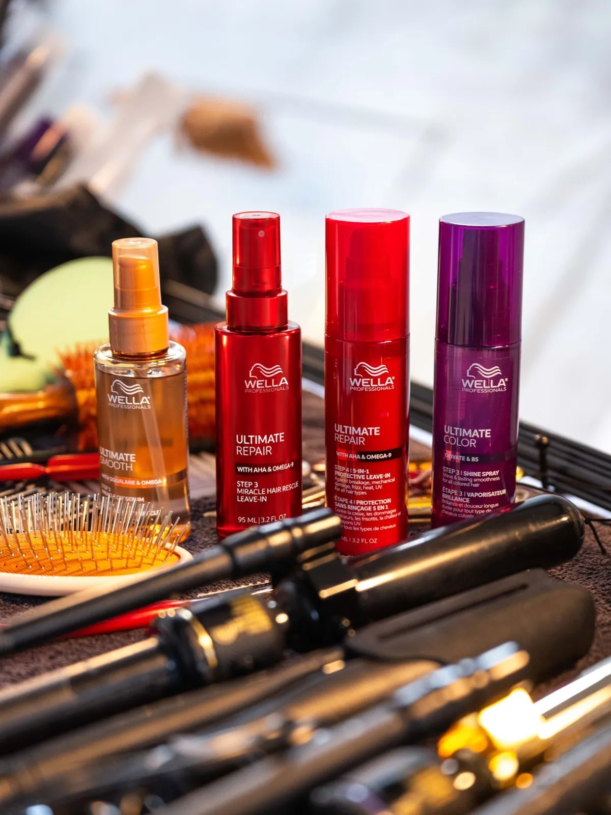 Wella Professionals hair products, including Miracle Hair Rescue, are seen in stylists’ kits backstage at Ulla Johnson