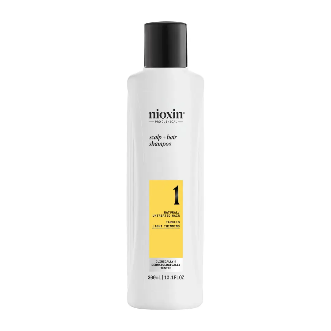 Nioxin System 1 Scalp + Hair Shampoo bottle against white background