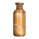 Eine goldene Flasche ULTIMATE SMOOTH Shampoo für trockenes, stumpfes und sprödes Haar von Wella Professionals.