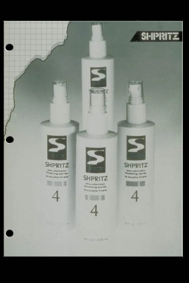 Four vintage-looking spray bottles of Sebastian Shpritz hairspray. 