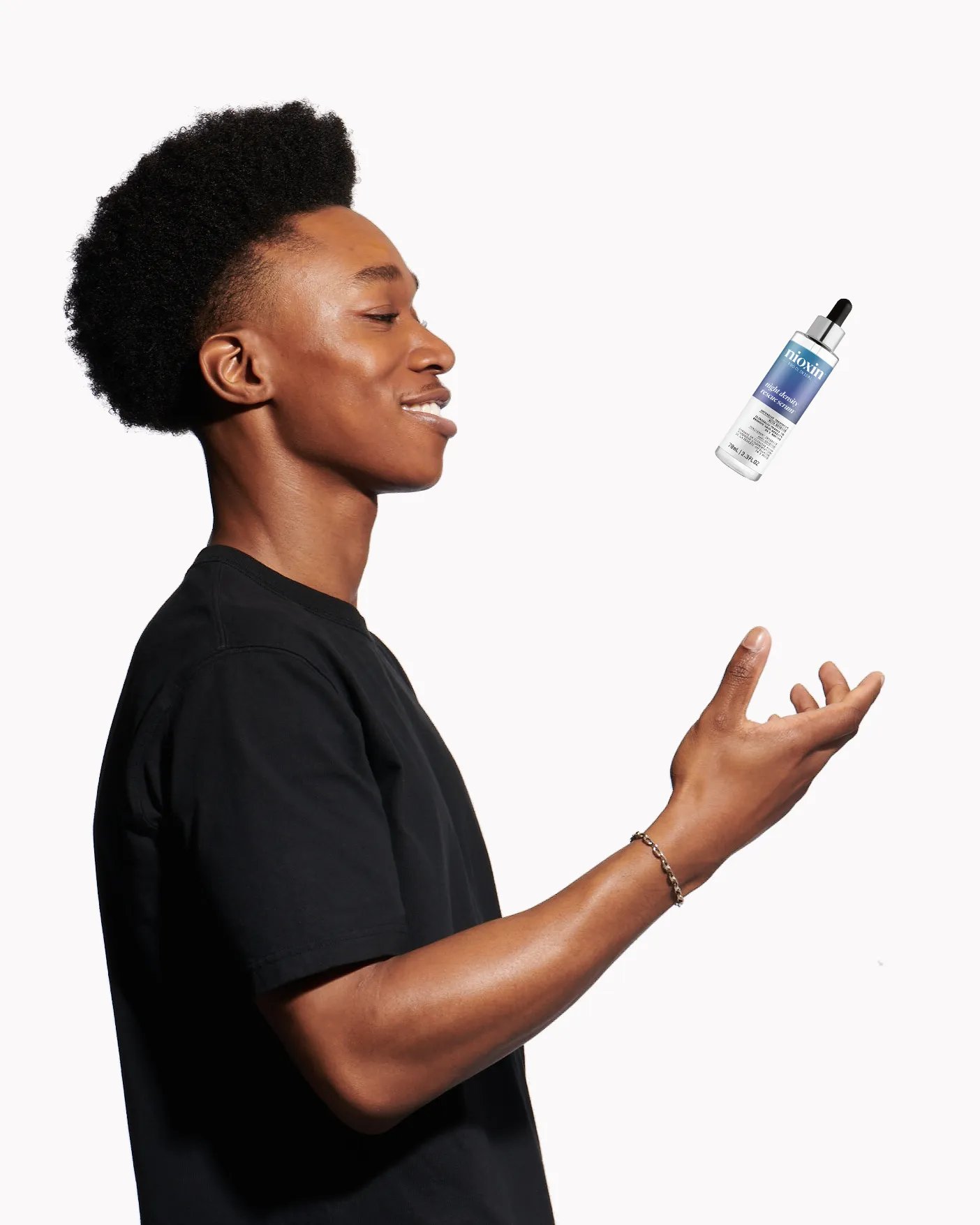 young man throwing serum in air 