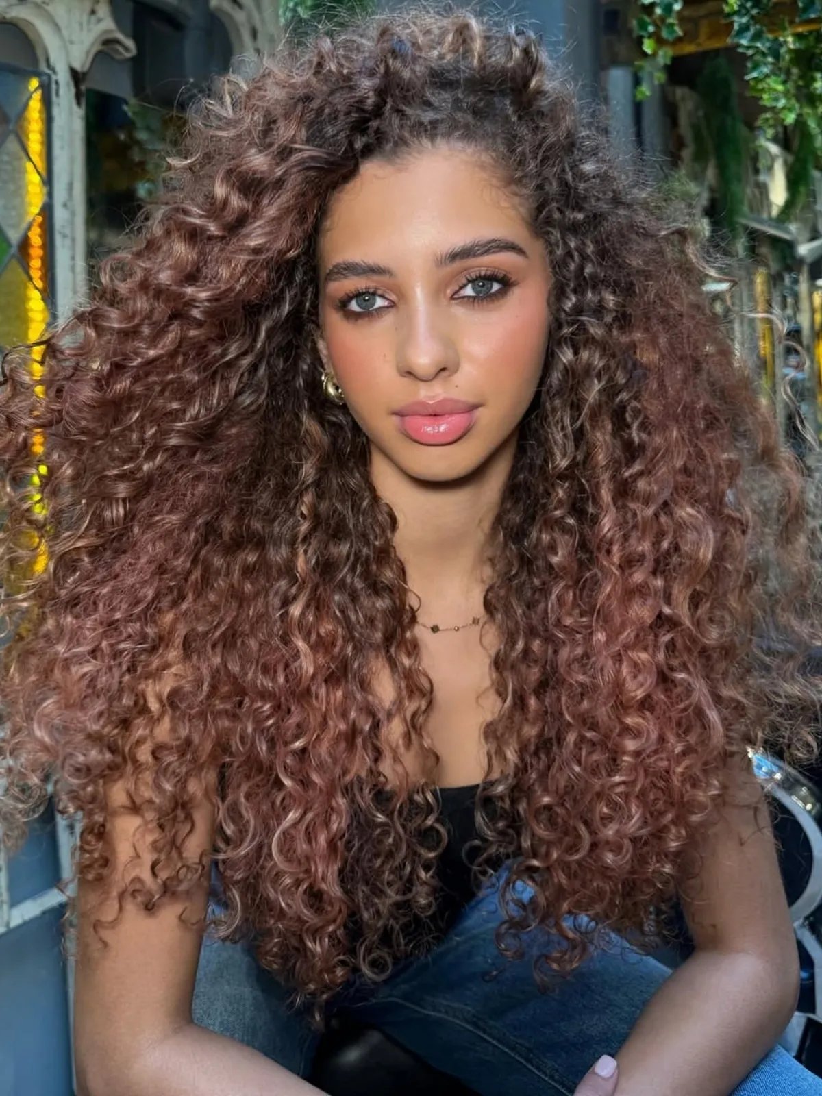 Medium rose brown hair with subtle pink undertones.