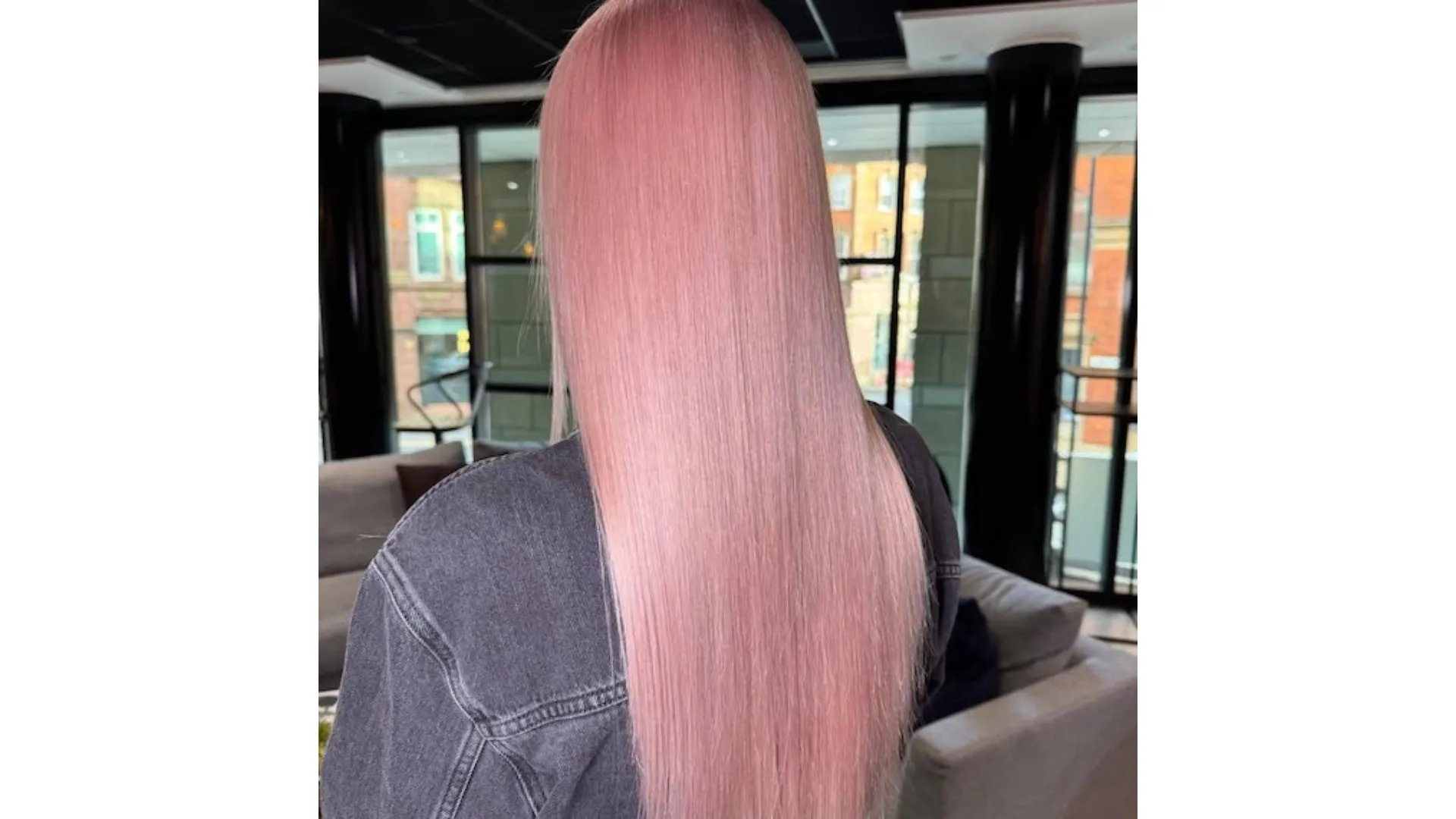 Model with long, straight, pastel rose hair.