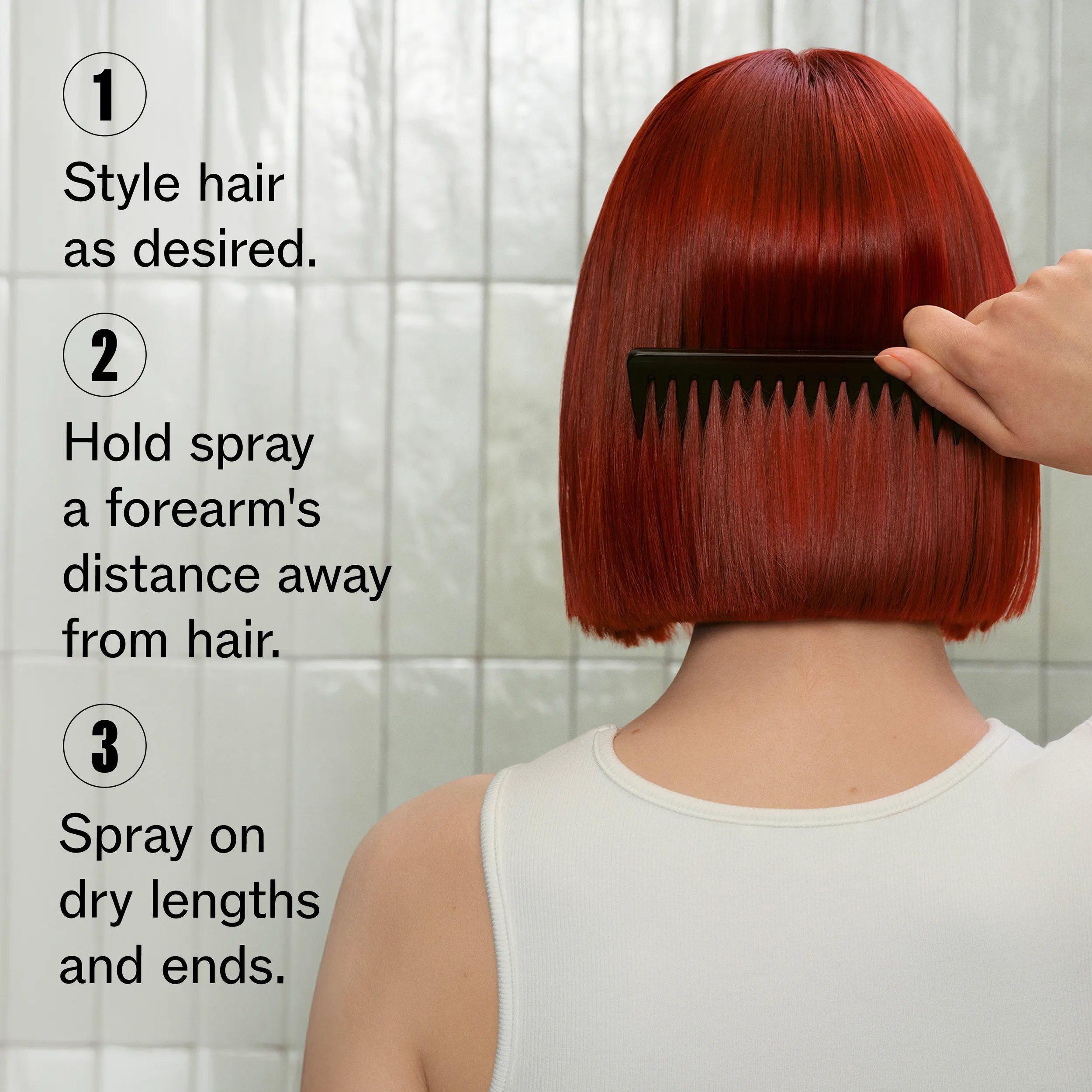 The back of a model's head, they have short, red hair. Text overlay reads "1. Style hair as desired. 2. Hold spray a forearm's distance away from hair. 3. Spray on dry lengths and ends." 