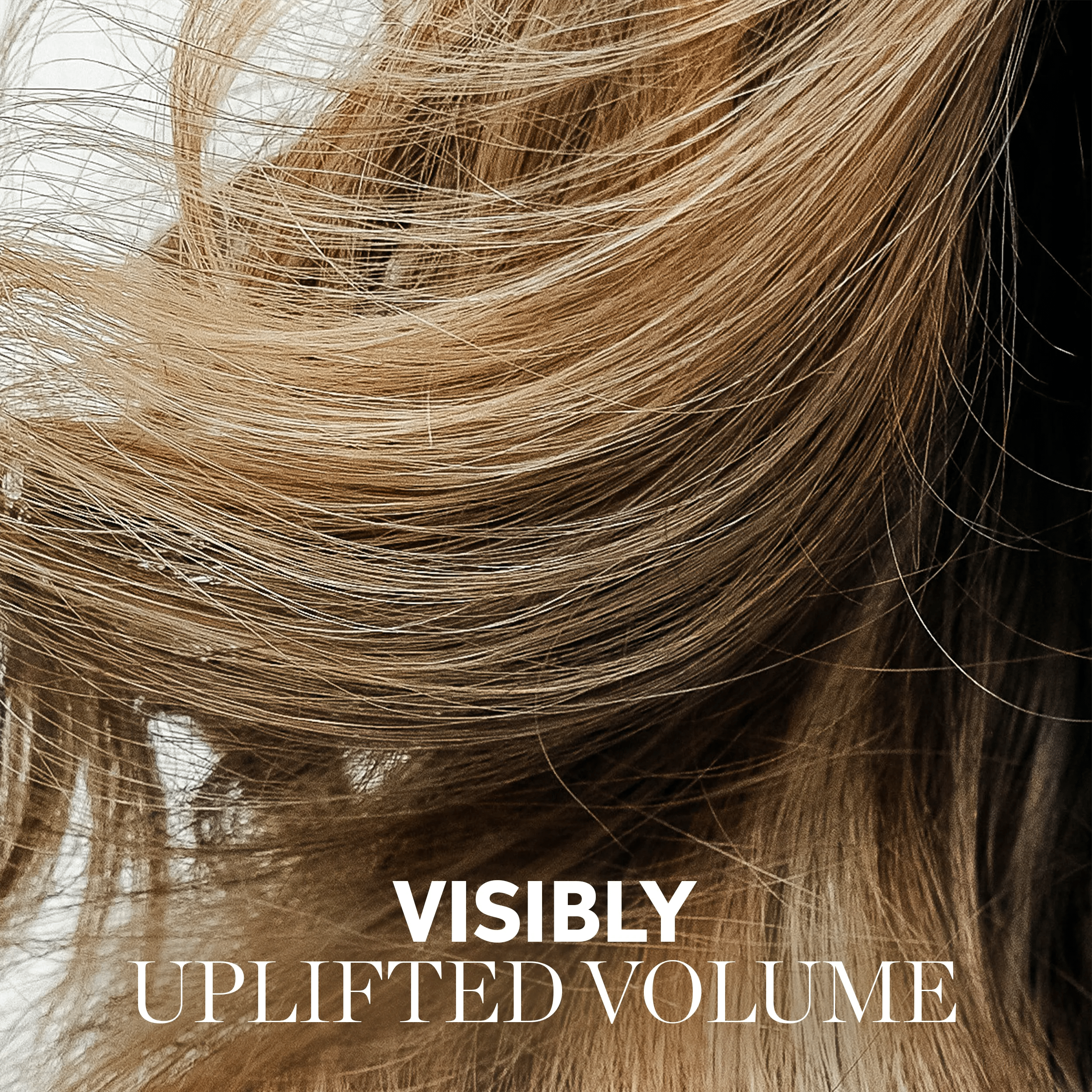Close-up of voluminous blonde hair with the text "VISIBLY UPLIFTED VOLUME" overlaid.