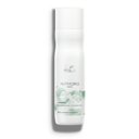 A bottle of Wella Professionals NutriCurls Waves Shampoo.