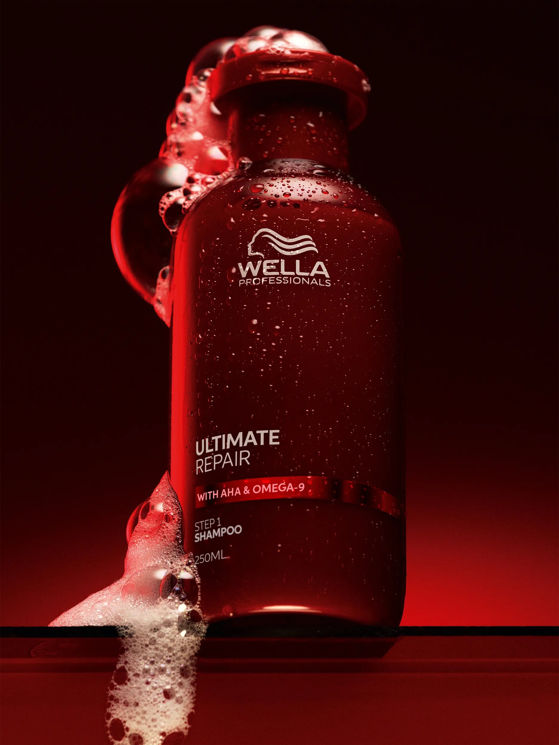 Foamy bubbles on a red surface.