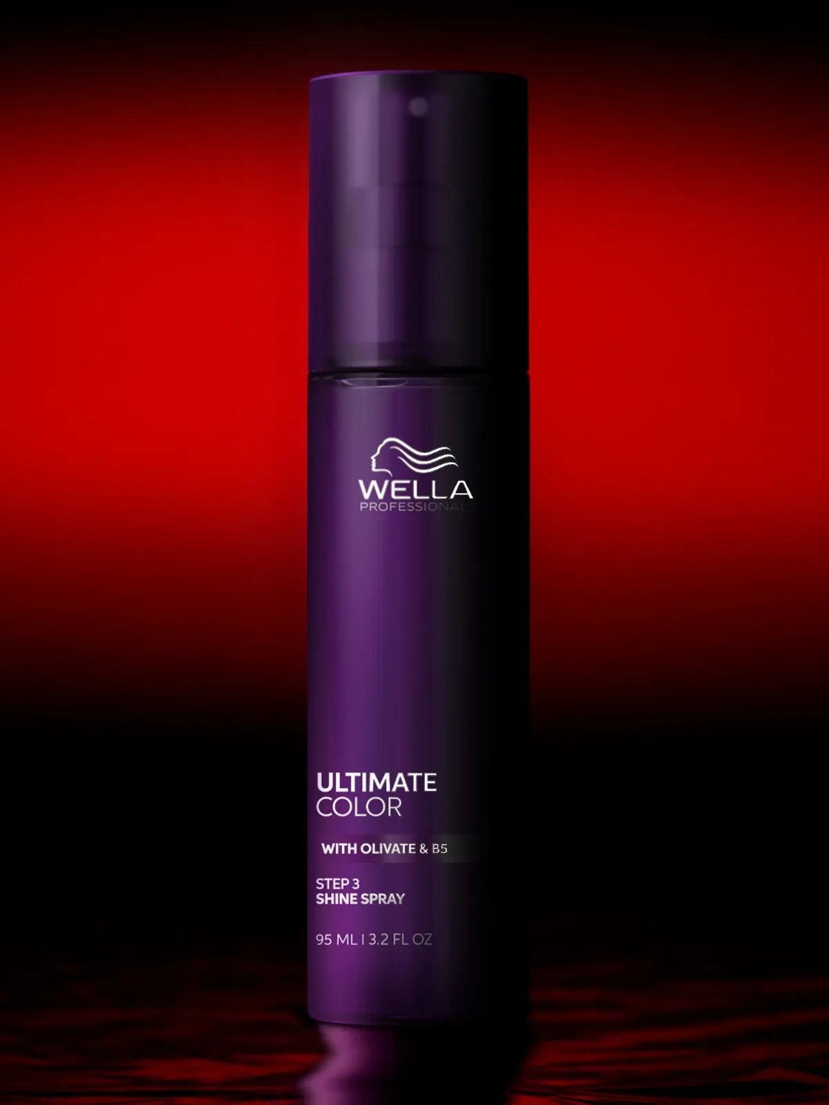 ULTIMATE COLOR Shine Spray against a red background.