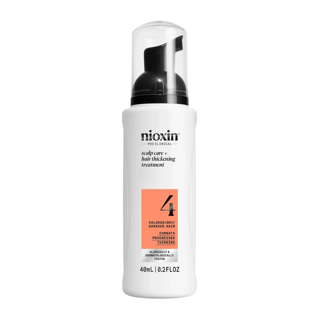 Nioxin System 4 scalp care and hair thickening treatment against white background