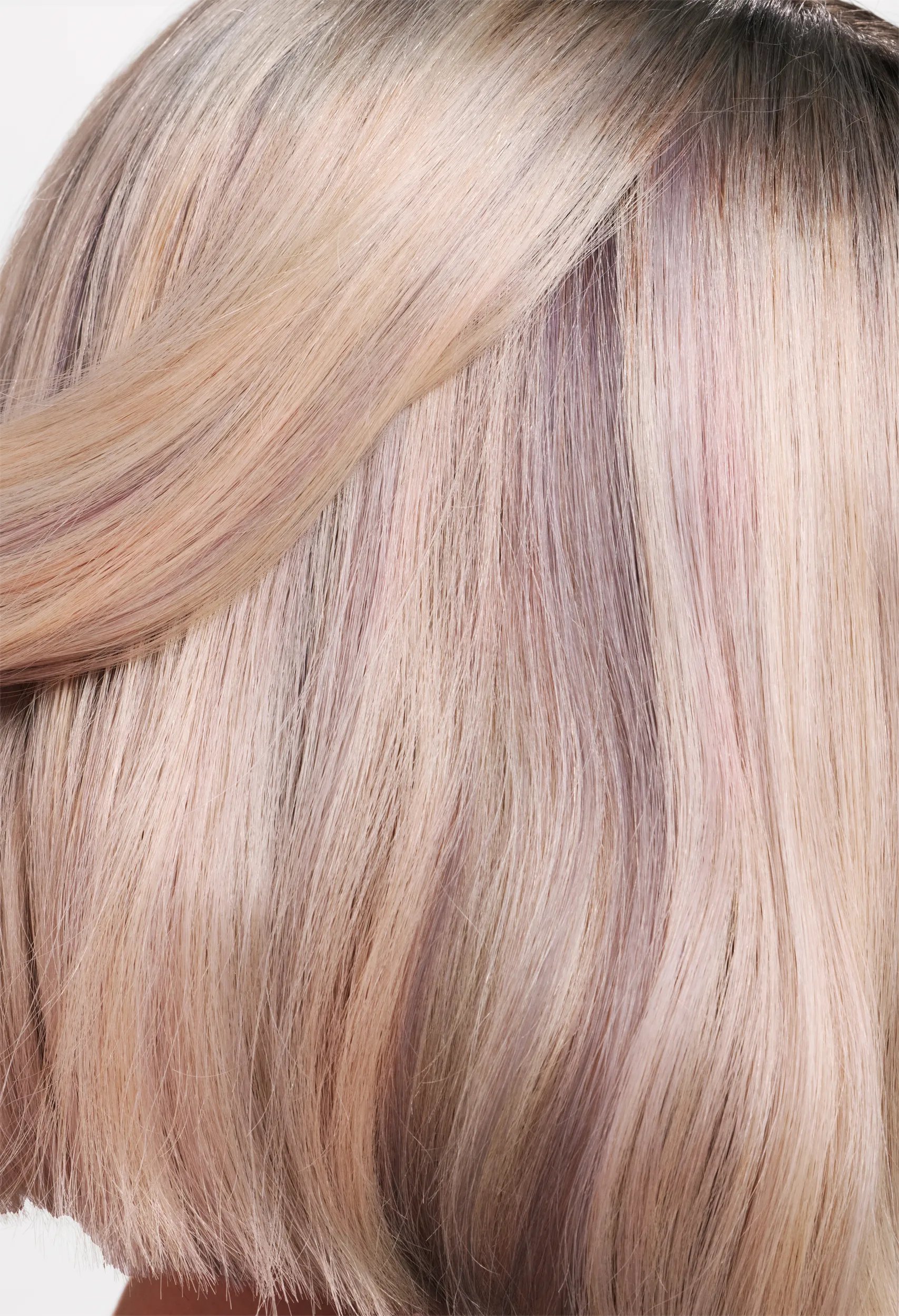 Model with platinum blonde bob haircut.